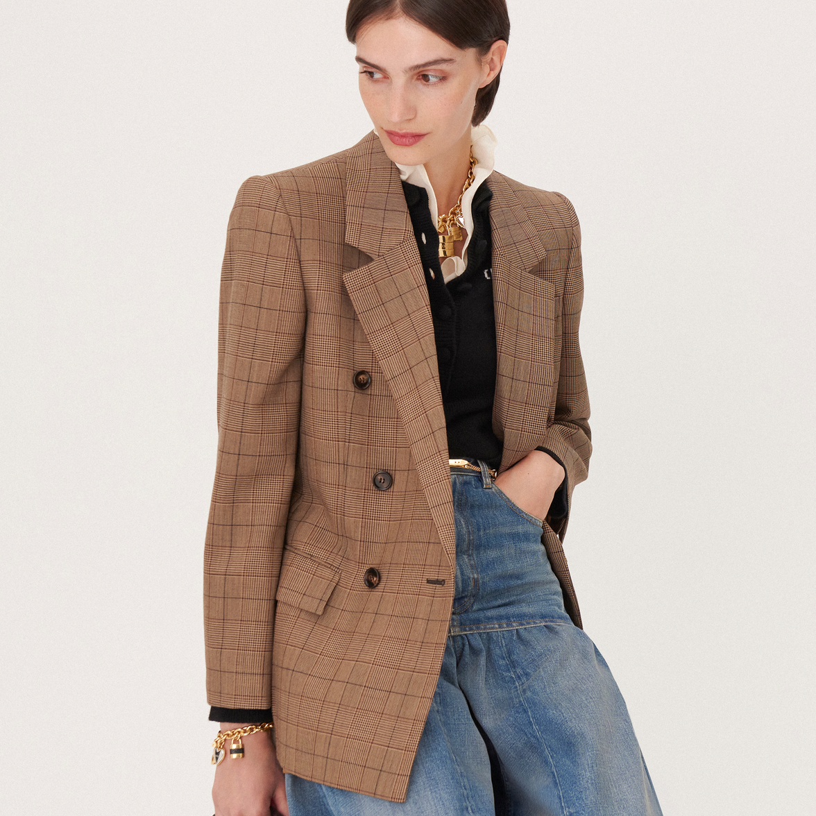Discover a sophisticated Chloé blazer paired with casual denim, blending Parisian elegance and contemporary style.