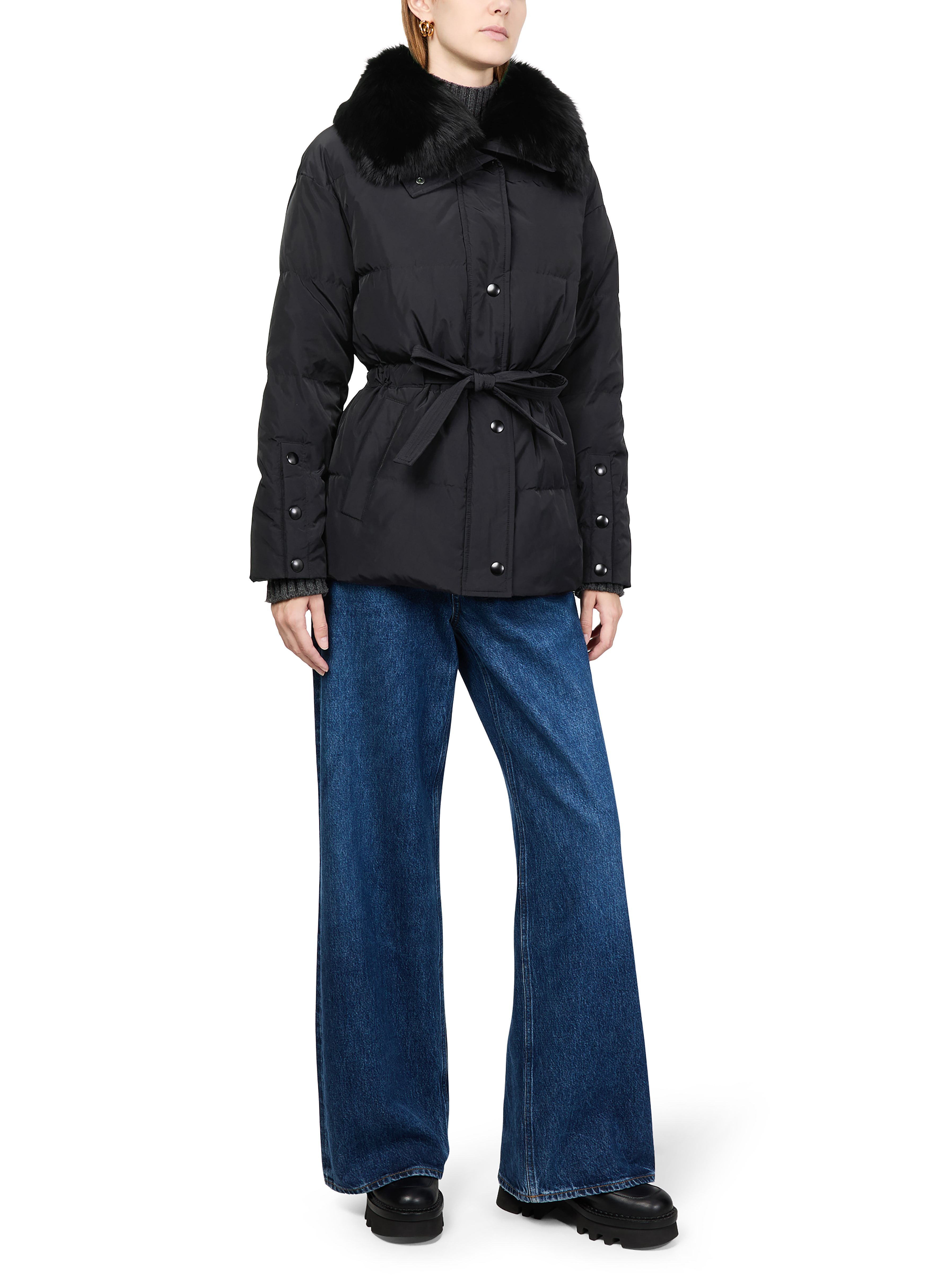 Puffer jacket with a fox fur collar 7