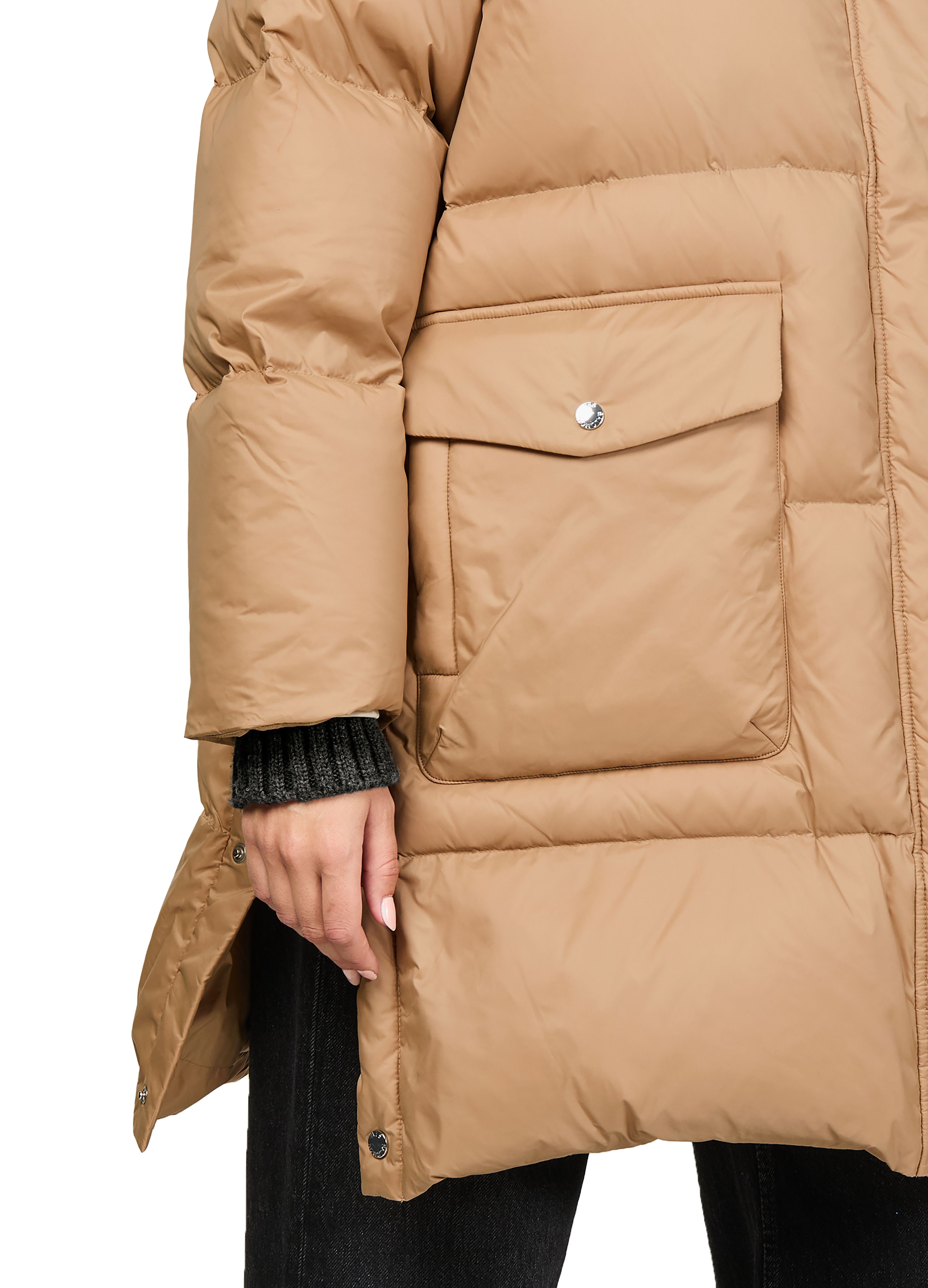 Puffer jacket with a fox fur hood 4