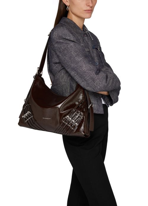GIVENCHY Medium Voyou bag in patent leather with multi-buckles