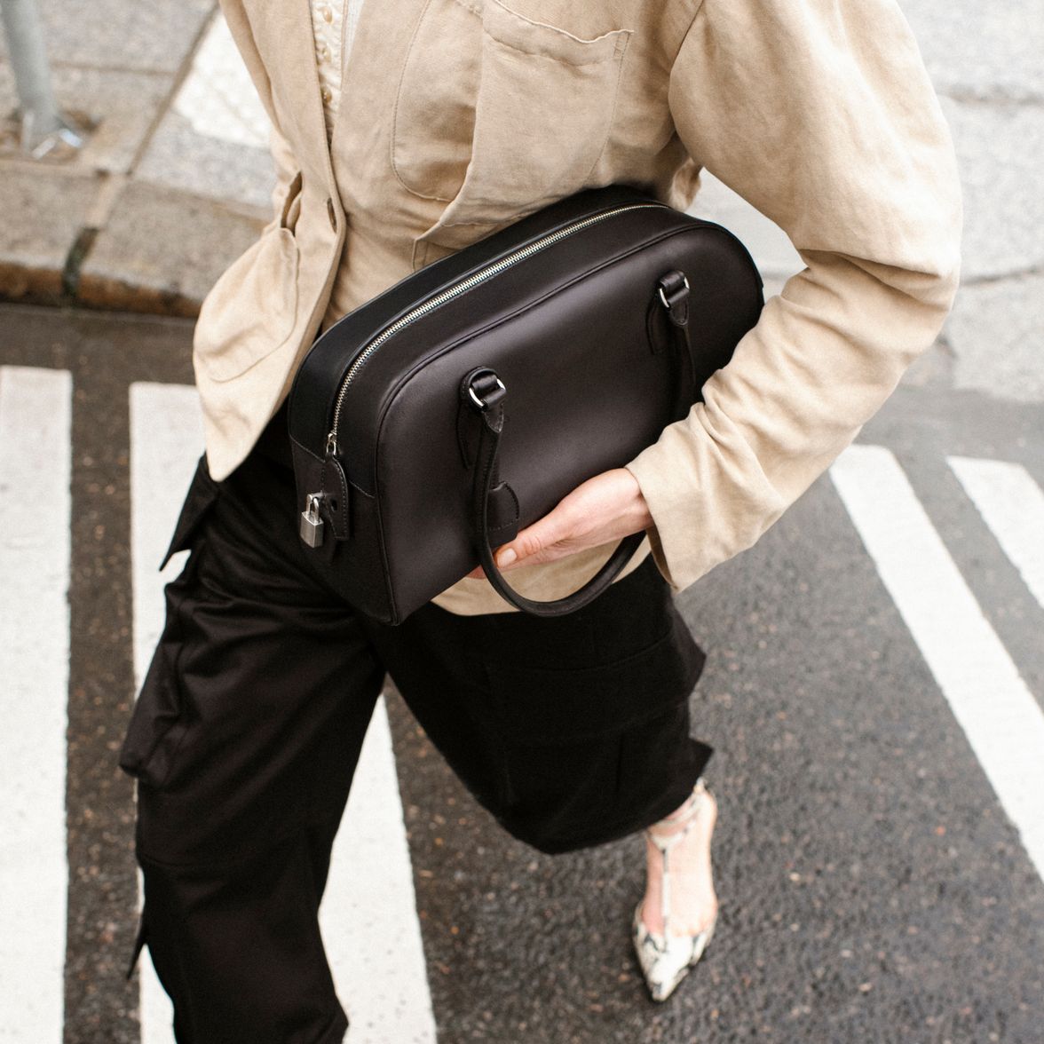 The Row lambskin bag, a soft and smooth leather that requires careful attention.