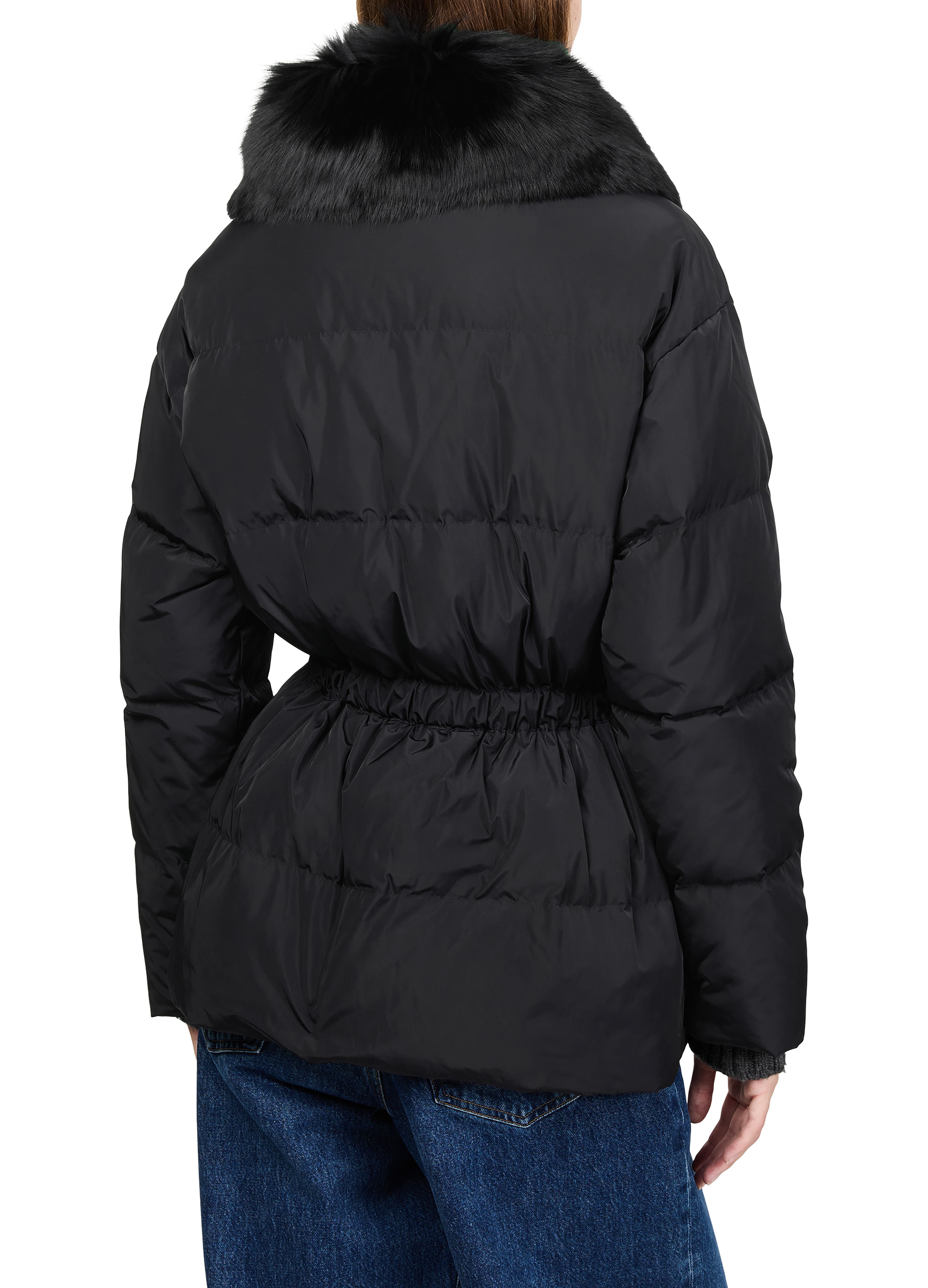 Puffer jacket with a fox fur collar 5