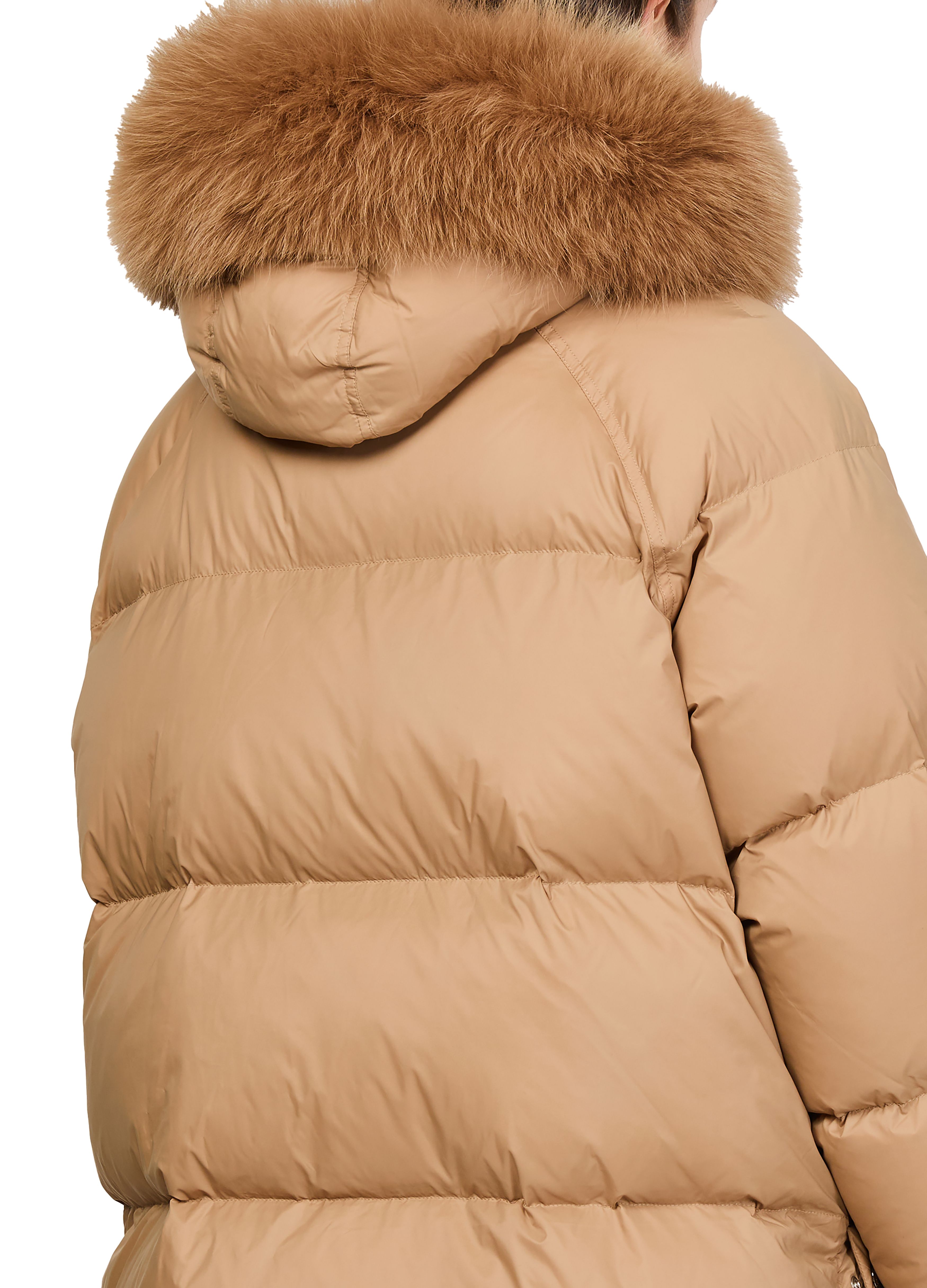 Puffer jacket with a fox fur hood 5