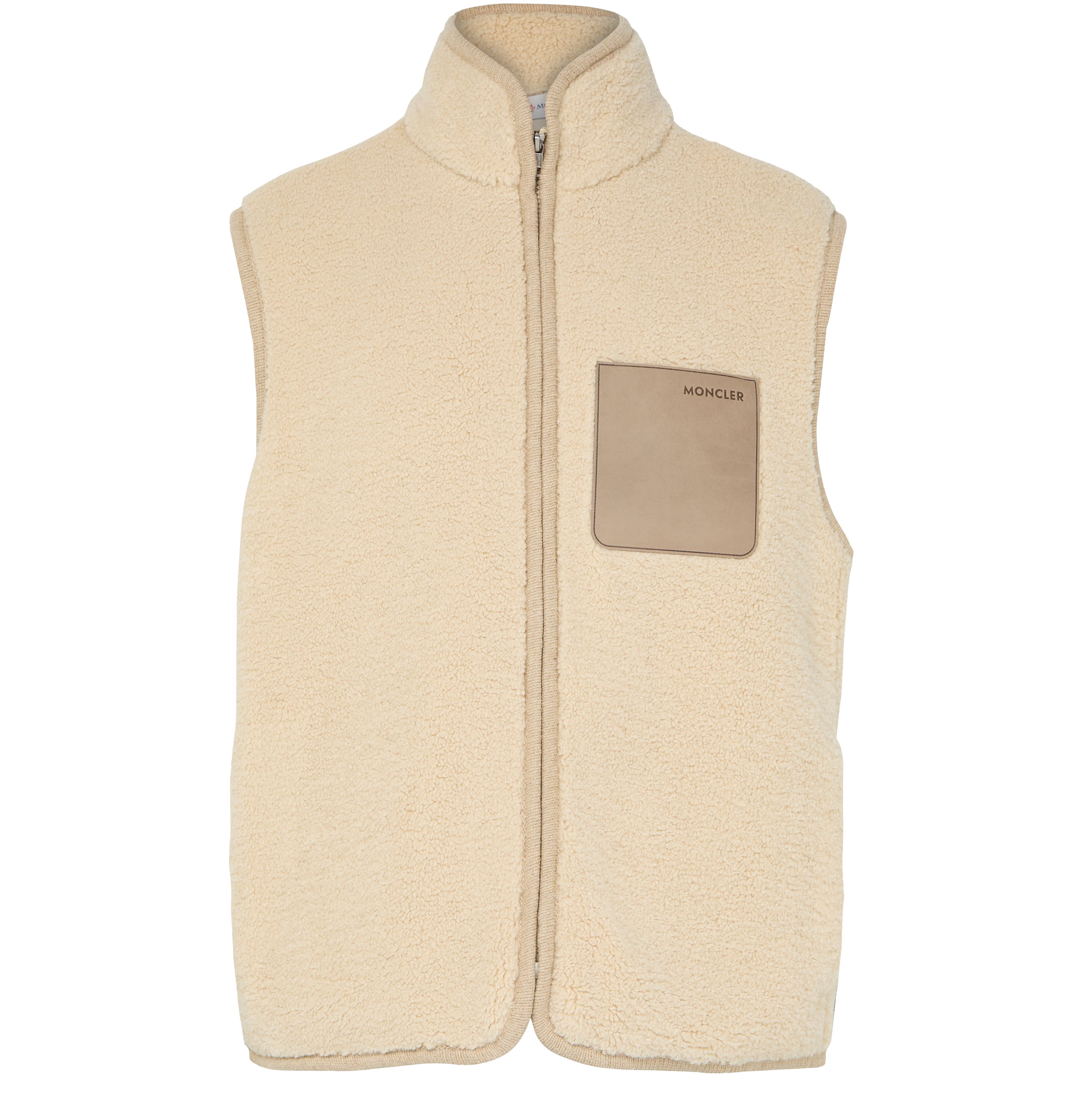 Zipped-up sleeveless jacket
